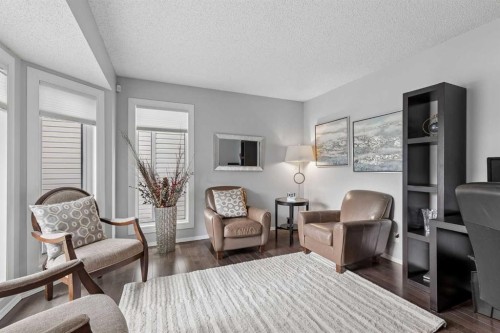 244 Scurfield Place Nw, Calgary, AB - Indoor Photo Showing Living Room
