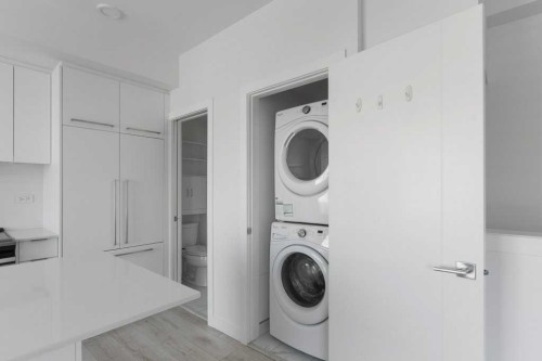 415-3130 Thirsk Street Nw, Calgary, AB - Indoor Photo Showing Laundry Room
