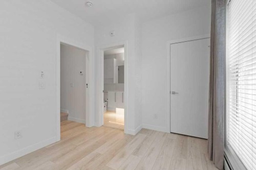 415-3130 Thirsk Street Nw, Calgary, AB - Indoor Photo Showing Other Room
