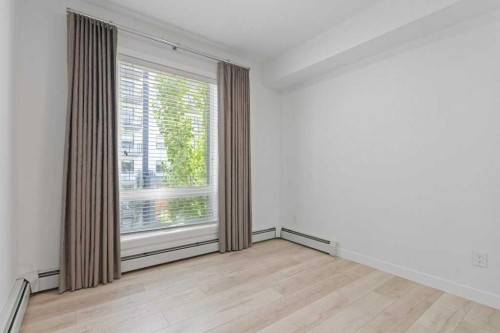 415-3130 Thirsk Street Nw, Calgary, AB - Indoor Photo Showing Other Room