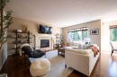 21 Chaparral Valley Court Se, Calgary, AB  - Indoor Photo Showing Living Room With Fireplace 