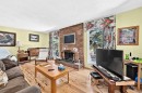 350 Silver Ridge Crescent Nw, Calgary, AB  - Indoor Photo Showing Living Room With Fireplace 