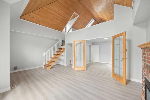 528 21 Avenue Sw, Calgary, AB - Indoor Photo Showing Other Room With Fireplace