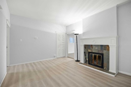 528 21 Avenue Sw, Calgary, AB - Indoor Photo Showing Living Room With Fireplace