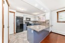112-315 50 Avenue Sw, Calgary, AB  - Indoor Photo Showing Kitchen With Upgraded Kitchen 