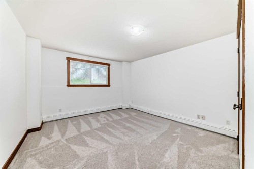 112-315 50 Avenue Sw, Calgary, AB - Indoor Photo Showing Other Room
