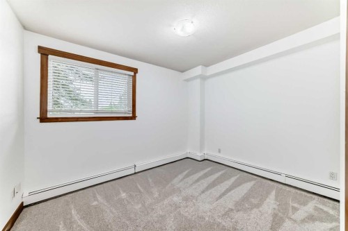 112-315 50 Avenue Sw, Calgary, AB - Indoor Photo Showing Other Room