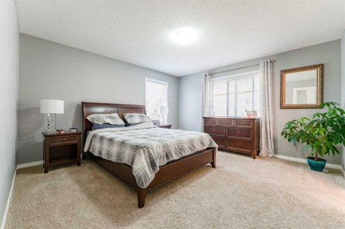 47 Panatella Bay Nw, Calgary, AB - Indoor Photo Showing Bedroom