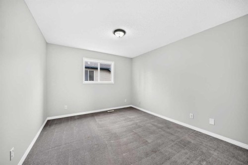 171 Oakmere Green, Chestermere, AB - Indoor Photo Showing Other Room