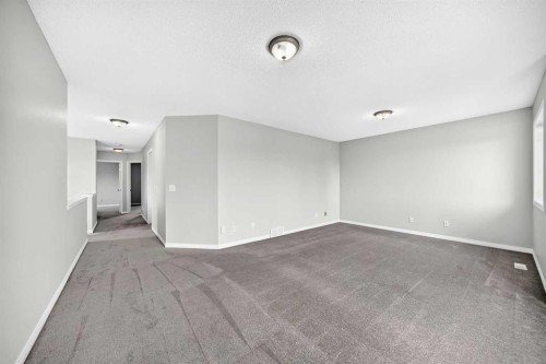 171 Oakmere Green, Chestermere, AB - Indoor Photo Showing Other Room