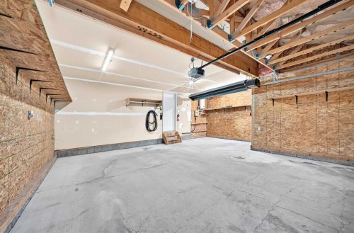 171 Oakmere Green, Chestermere, AB - Indoor Photo Showing Garage