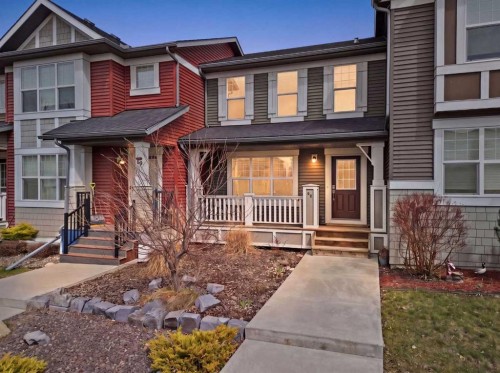 93 Sunvalley Road, Cochrane, AB - Outdoor With Deck Patio Veranda With Facade