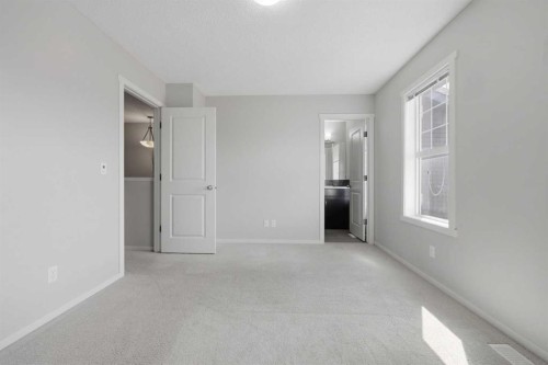 93 Sunvalley Road, Cochrane, AB - Indoor Photo Showing Other Room