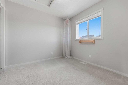 93 Sunvalley Road, Cochrane, AB - Indoor Photo Showing Other Room