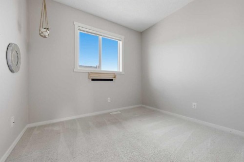 93 Sunvalley Road, Cochrane, AB - Indoor Photo Showing Other Room