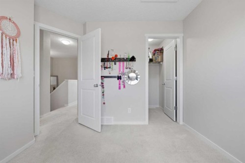 93 Sunvalley Road, Cochrane, AB - Indoor Photo Showing Other Room