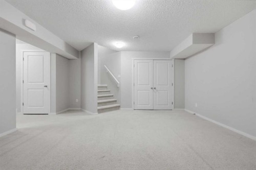 93 Sunvalley Road, Cochrane, AB - Indoor Photo Showing Other Room
