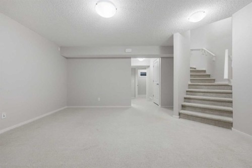 93 Sunvalley Road, Cochrane, AB - Indoor Photo Showing Other Room