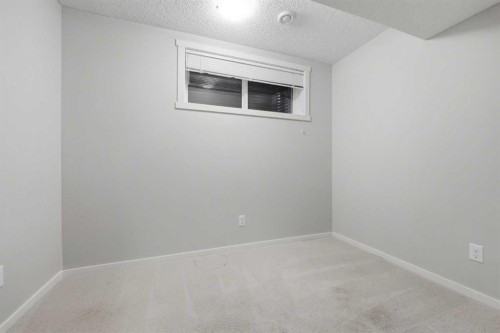 93 Sunvalley Road, Cochrane, AB - Indoor Photo Showing Other Room