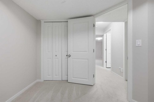 93 Sunvalley Road, Cochrane, AB - Indoor Photo Showing Other Room