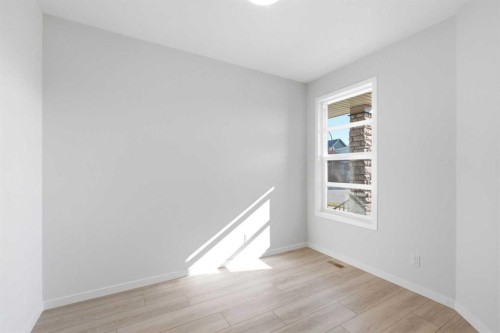 572 Belmont Heath Sw, Calgary, AB - Indoor Photo Showing Other Room