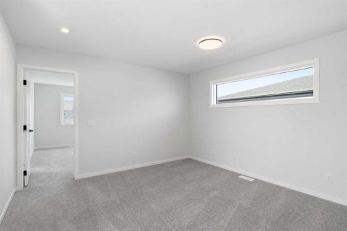 572 Belmont Heath Sw, Calgary, AB - Indoor Photo Showing Other Room