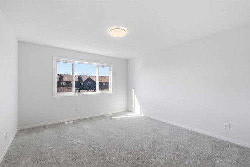 572 Belmont Heath Sw, Calgary, AB - Indoor Photo Showing Other Room
