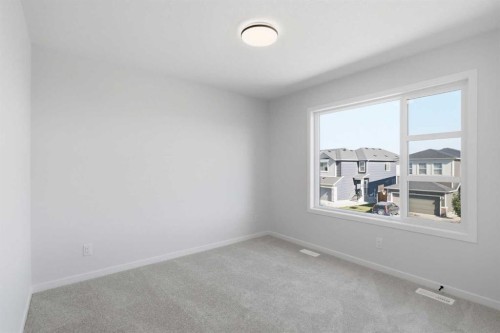 572 Belmont Heath Sw, Calgary, AB - Indoor Photo Showing Other Room