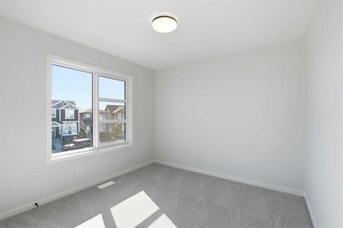 572 Belmont Heath Sw, Calgary, AB - Indoor Photo Showing Other Room