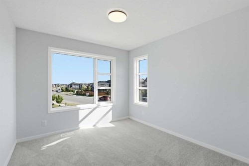 572 Belmont Heath Sw, Calgary, AB - Indoor Photo Showing Other Room