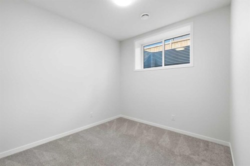 572 Belmont Heath Sw, Calgary, AB - Indoor Photo Showing Other Room