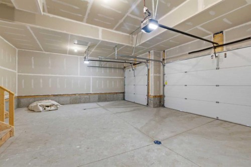 572 Belmont Heath Sw, Calgary, AB - Indoor Photo Showing Garage