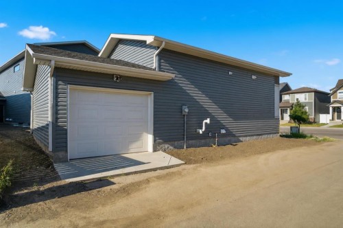 572 Belmont Heath Sw, Calgary, AB - Outdoor With Exterior