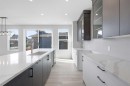 572 Belmont Heath Sw, Calgary, AB  - Indoor Photo Showing Kitchen With Upgraded Kitchen 