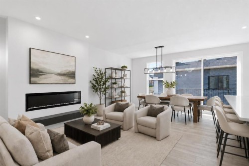 572 Belmont Heath Sw, Calgary, AB - Indoor Photo Showing Living Room With Fireplace