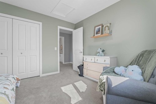 6 Storm Mountain Place, Okotoks, AB - Indoor Photo Showing Bedroom