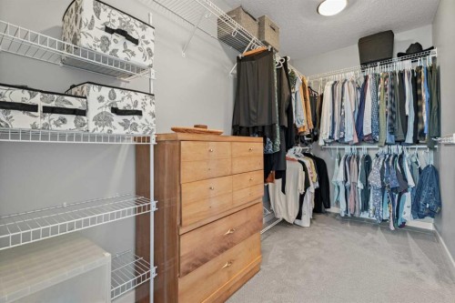 6 Storm Mountain Place, Okotoks, AB - Indoor With Storage