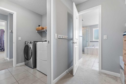 6 Storm Mountain Place, Okotoks, AB - Indoor Photo Showing Laundry Room