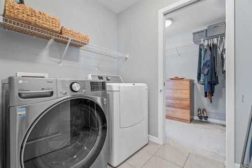 6 Storm Mountain Place, Okotoks, AB - Indoor Photo Showing Laundry Room