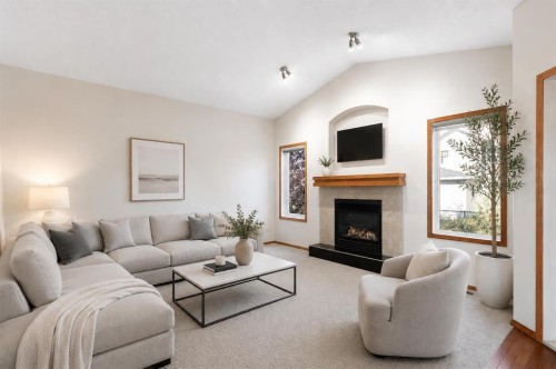 1207 Westmount Drive, Strathmore, AB - Indoor Photo Showing Living Room With Fireplace