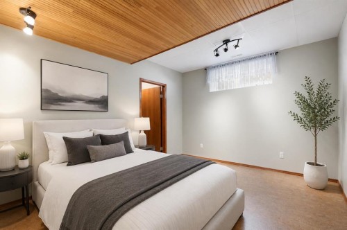 1207 Westmount Drive, Strathmore, AB - Indoor Photo Showing Bedroom