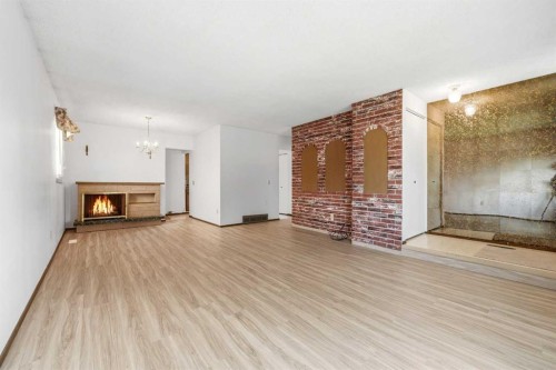 3803 14 Avenue Ne, Calgary, AB - Indoor With Fireplace