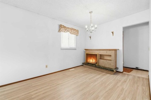 3803 14 Avenue Ne, Calgary, AB - Indoor With Fireplace