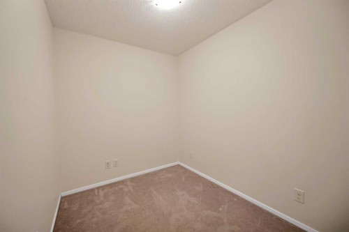 1209-4641 128 Avenue Ne, Calgary, AB - Indoor Photo Showing Other Room