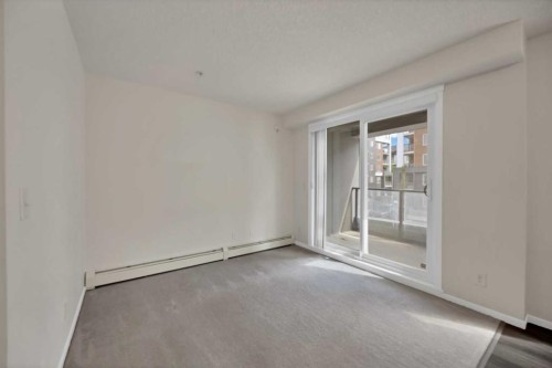 1209-4641 128 Avenue Ne, Calgary, AB - Indoor Photo Showing Other Room