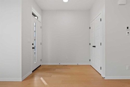 83 Wolf Hollow Rise Se, Calgary, AB - Indoor Photo Showing Other Room