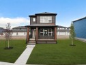 83 Wolf Hollow Rise Se, Calgary, AB  - Outdoor With Facade 