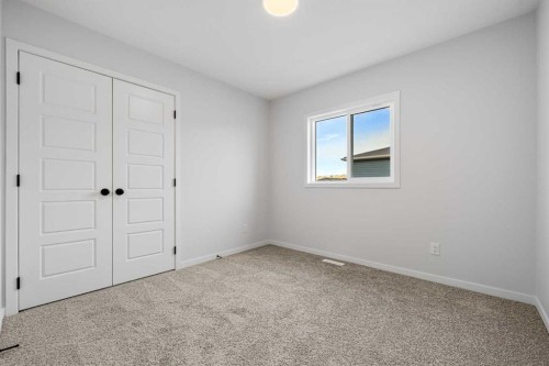 83 Wolf Hollow Rise Se, Calgary, AB - Indoor Photo Showing Other Room