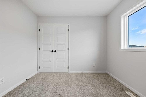 83 Wolf Hollow Rise Se, Calgary, AB - Indoor Photo Showing Other Room