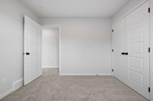 83 Wolf Hollow Rise Se, Calgary, AB - Indoor Photo Showing Other Room